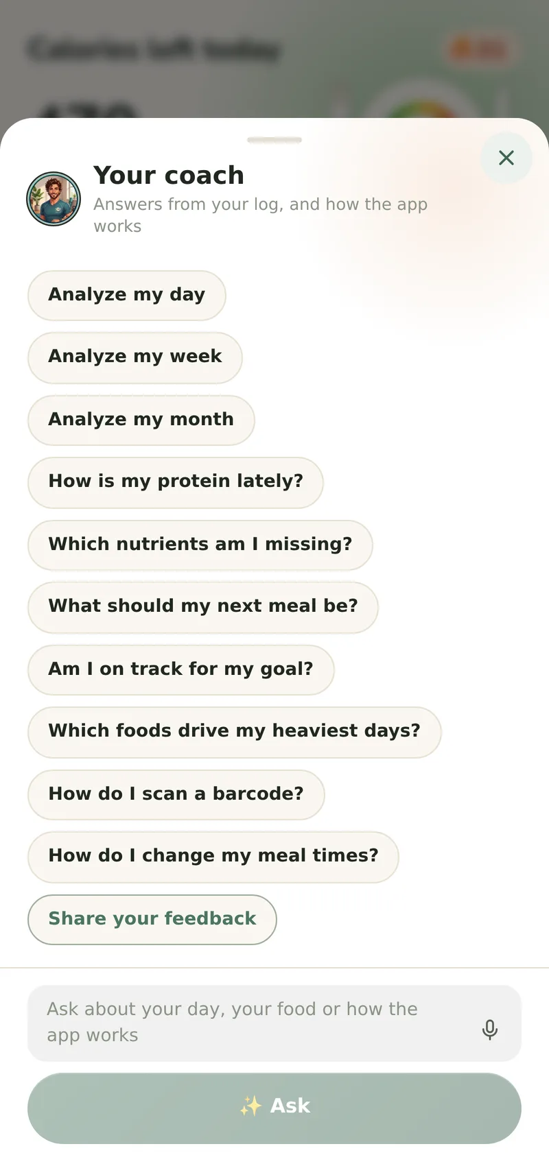 The coach sheet open over Home: the coach's face beside the title Your coach, a column of suggested questions from Analyze my day to How do I change my meal times?, and the box under them that takes any question about your day, your food or how the app works